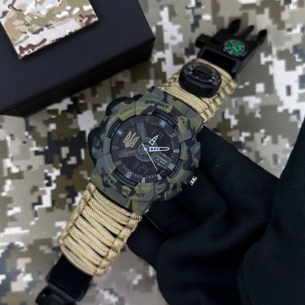 Patriot 005 Тризуб золото Camo Green Паракордовий ремінець Khaki + Коробка. - 1201-0427-30 Patriot 005 Тризуб золото Camo Green Паракордовий ремінець Khaki + Коробка. - 1201-0427-30
