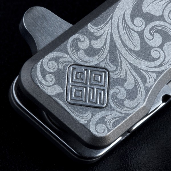Ніж Ocaso "Solstice", Engraved titanium, Scroll Pattern, Satin - 10ESS Ніж Ocaso "Solstice", Engraved titanium, Scroll Pattern, Satin - 10ESS