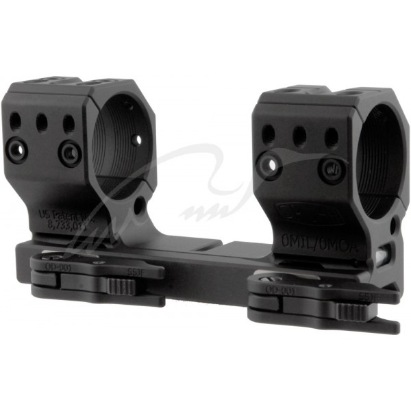 Быстросъемное крепление-моноблок Spuhr QDP-4002. Диаметр - 34 мм. Высота основания - 21 мм. Длина - 121 мм. На планку Picatinny - 